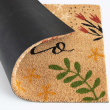 Outdoor coir doormat corner with 'hello' lettering and green leaf floral print