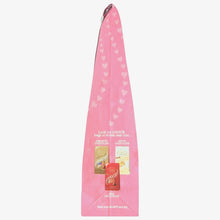 Pink Lindor candy pouch with small chocolate bars shown near bottom