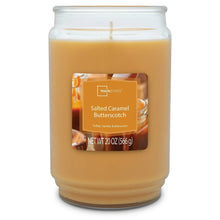 Salted caramel butterscotch scented candle in glass jar with single wick