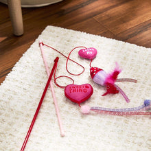 Cat teaser wand set with red and pink handles, heart toys and fuzzy feather accents