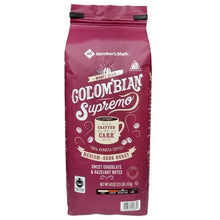 Whole bean coffee bag, maroon front with roast and tasting notes