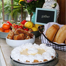 White round porcelain serve bowl with food inside