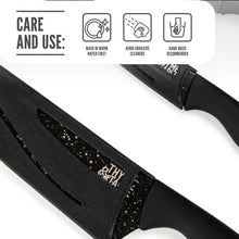 Black knife handle and speckled non-stick blade close-up