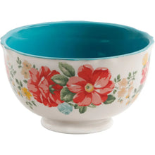 Floral cereal bowl with teal rim and interior, red flowers on white exterior