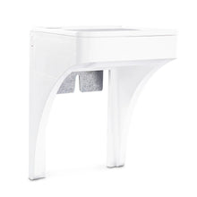 White outlet shelf with gray cord storage cutout beneath the tabletop
