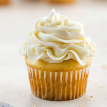 Vanilla cupcake with swirled white frosting