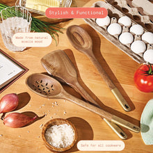 Wood kitchen utensil set with wide spoon, slotted spoon, and angled spatula