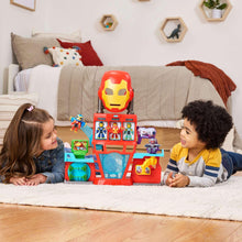 Iron Man playset with character slots and spinning arm figures on a tabletop