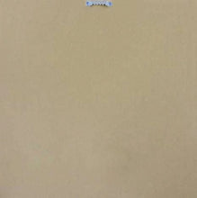 Decorative wall mirror with white frame, partially visible
