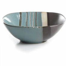Teal striped dinner bowl with vertical cream and dark stripe pattern