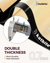 Black silicone baking mat with double-thickness design and thickness measurement.
