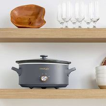 Mussel gray slow cooker with lid, side handles, and round thermostat knob