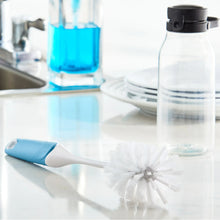 Blue-and-white bottle cleaning brush with wide circular bristle head