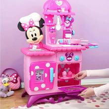 Pink Minnie Mouse pretend play kitchen set with sink counter and open oven door
