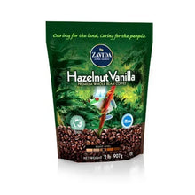 Zavida Hazelnut Vanilla whole bean coffee bag, green pouch with coffee bean graphic