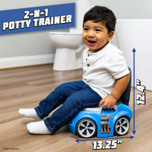 Toddler seated on blue race car potty trainer with white toilet insert