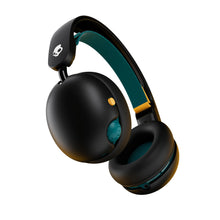Black over-ear headphones with teal ear controls and adjustable headband