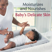 Baby lotion being applied to infant skin by a caregiver