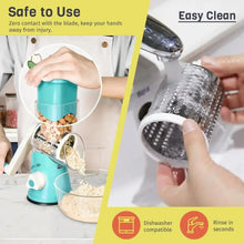 Rotary cheese grater being used with stainless shred drum and food container, teal base