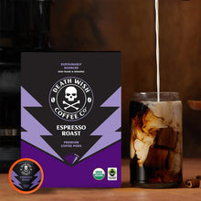 Espresso roast coffee pod box with orange pod disc and glass jar