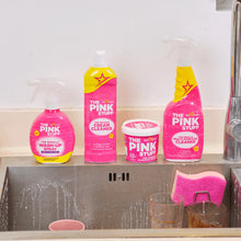 Pink Stuff cleaning products lineup with a paste tub on the counter