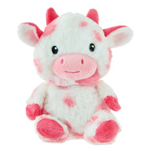 Pink and white cow plush with smiling face, soft ears and hooves