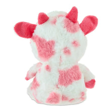 Pink and white cow plush viewed from behind, with upright ears