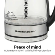 Glass electric kettle with measurement markings and Hamilton Beach logo on base