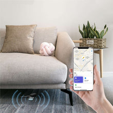 Wireless item locator key tags and smartphone showing a location map