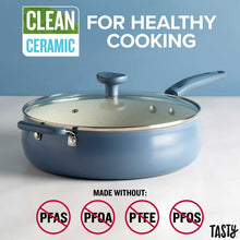 Blue ceramic non-stick cooker pan with glass lid, vented knob, and side handles