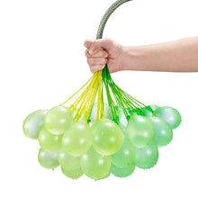 Self-sealing water balloon bunch with green balloons held by a hand