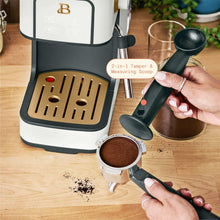 White slim espresso machine with portafilter, tamper, and measuring scoop