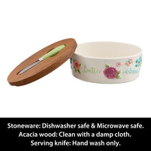 Floral ceramic butter dish with acacia lid and green-handled serving knife, lid open