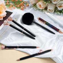 Black fancy ballpoint pens with rose-gold trim and colorful heart patterned barrels