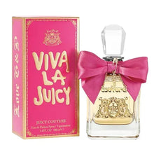 Perfume bottle with pink satin bow and gold charm, shown with pink product box