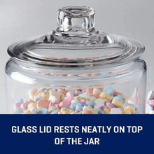 Glass storage jar with clear lid filled with pastel wrapped candy pieces