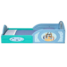 Toddler bed with guardrails, blue and teal frame with oval character window detail