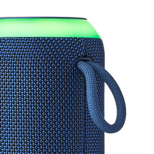 Navy fabric Bluetooth speaker with textured grip and carry strap