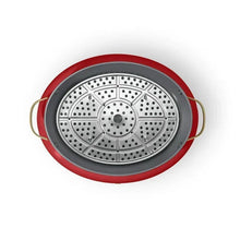 Red multi-cooker perforated steaming tray with patterned holes