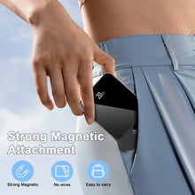 Magnetic wireless power bank attached to pants waistband for hands-free charging