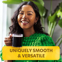Coffee mug with dark coffee, 'Uniquely smooth & versatile' label