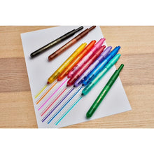 Colorful Crayola Clicks retractable markers on paper, visible cone tips