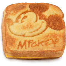 Toasted sandwich with Mickey Mouse imprint and printed character details
