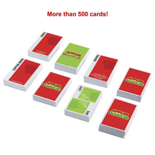 Apples to Apples card decks, red and green card stacks on a table