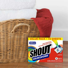 Laundry color catcher sheets value pack beside folded towels in a basket