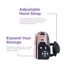 Pink camcorder with adjustable hand strap and rear storage bay visible