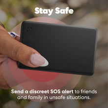 Black rectangular Tile Bluetooth tracker held in a hand