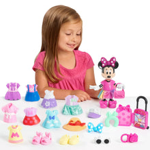 Minnie Mouse articulated doll in pink outfit with multiple accessory pieces