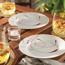 White glass appetizer plate with red and gray swirl pattern