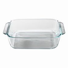 Clear glass baking dish with teal rim and side handles